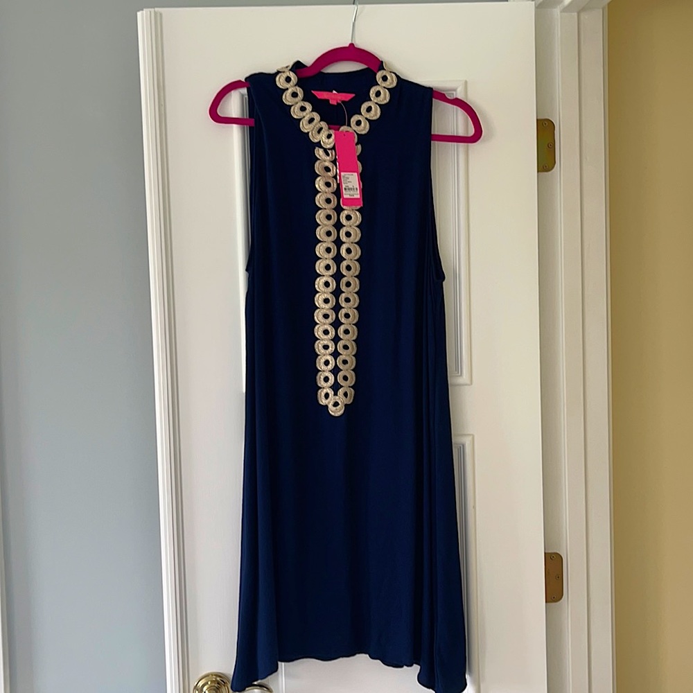 Polished Navy Blue Lilly shift with gold trim!